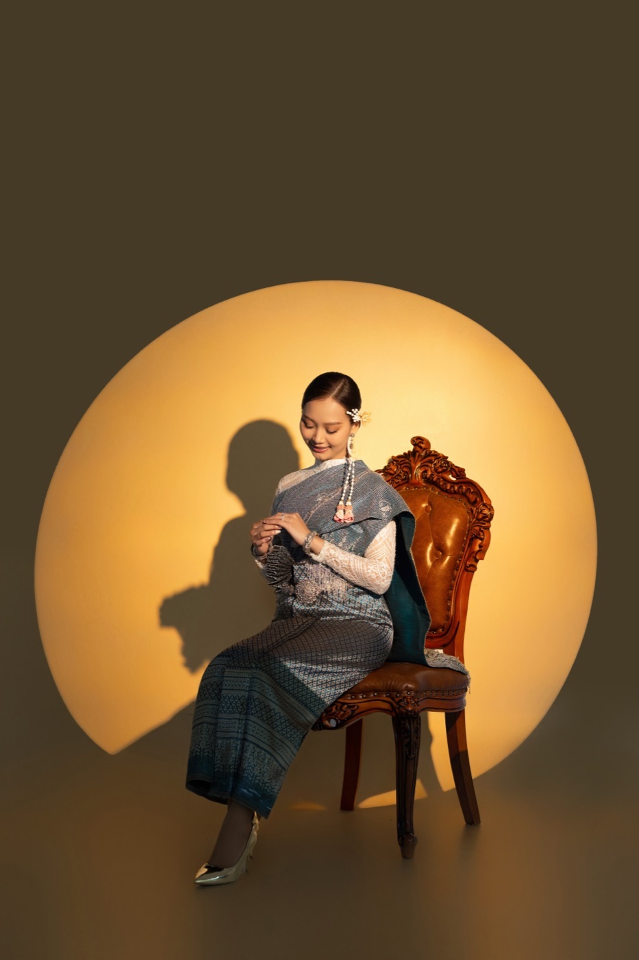 The bride, lit by a single circle
